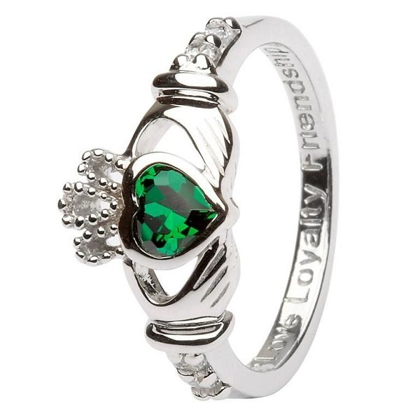 sterling silver claddagh ring with the may birthstone, an emerald colored crystal, and engraved with love loyalty friendship