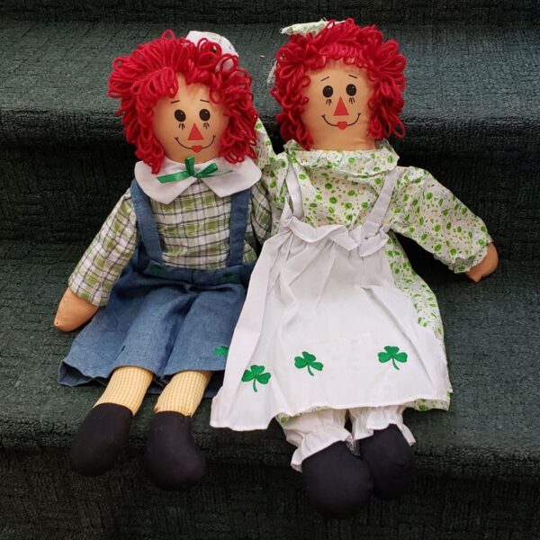 Irish Raggedy Ann and Andy seated on stairs