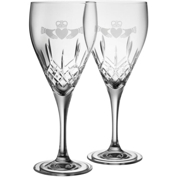 pair of galway crystal red wine glasses with claddaghs etched on them